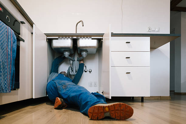 Professional Emergency Plumber technician working in Le Roy, MN